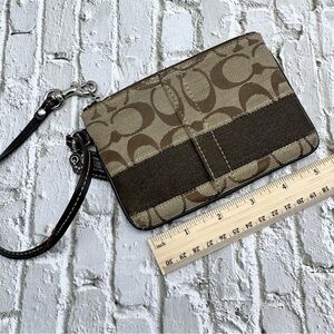 Coach small coin purse. Brown. Good condition.